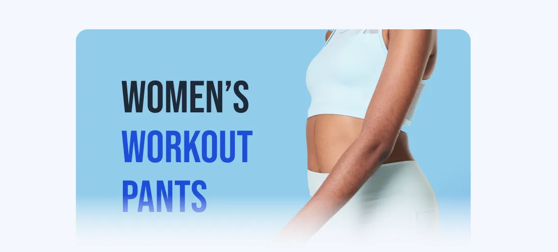 Side view of a woman wearing light blue workout pants and a cropped top on a blue background.